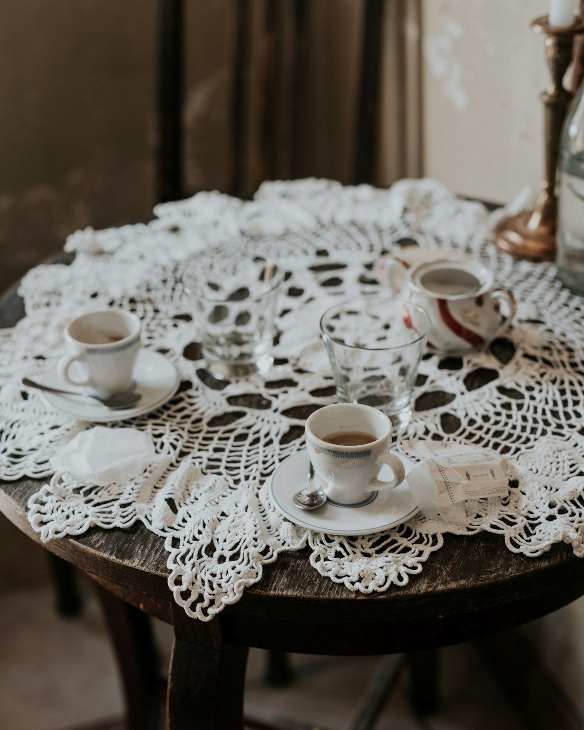 Two cups of tea on a linen tablecloth in soft light